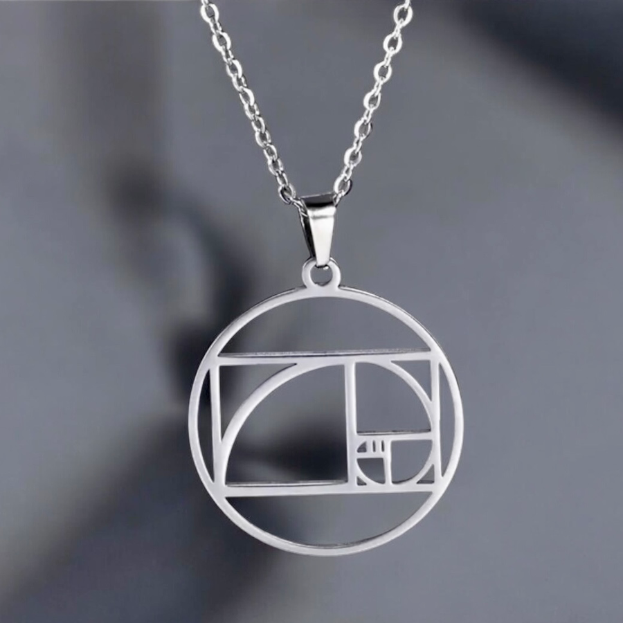 Naszyjnik ze spiral Fibonacciego  symbol harmonii i proporcji (2,5 cm)